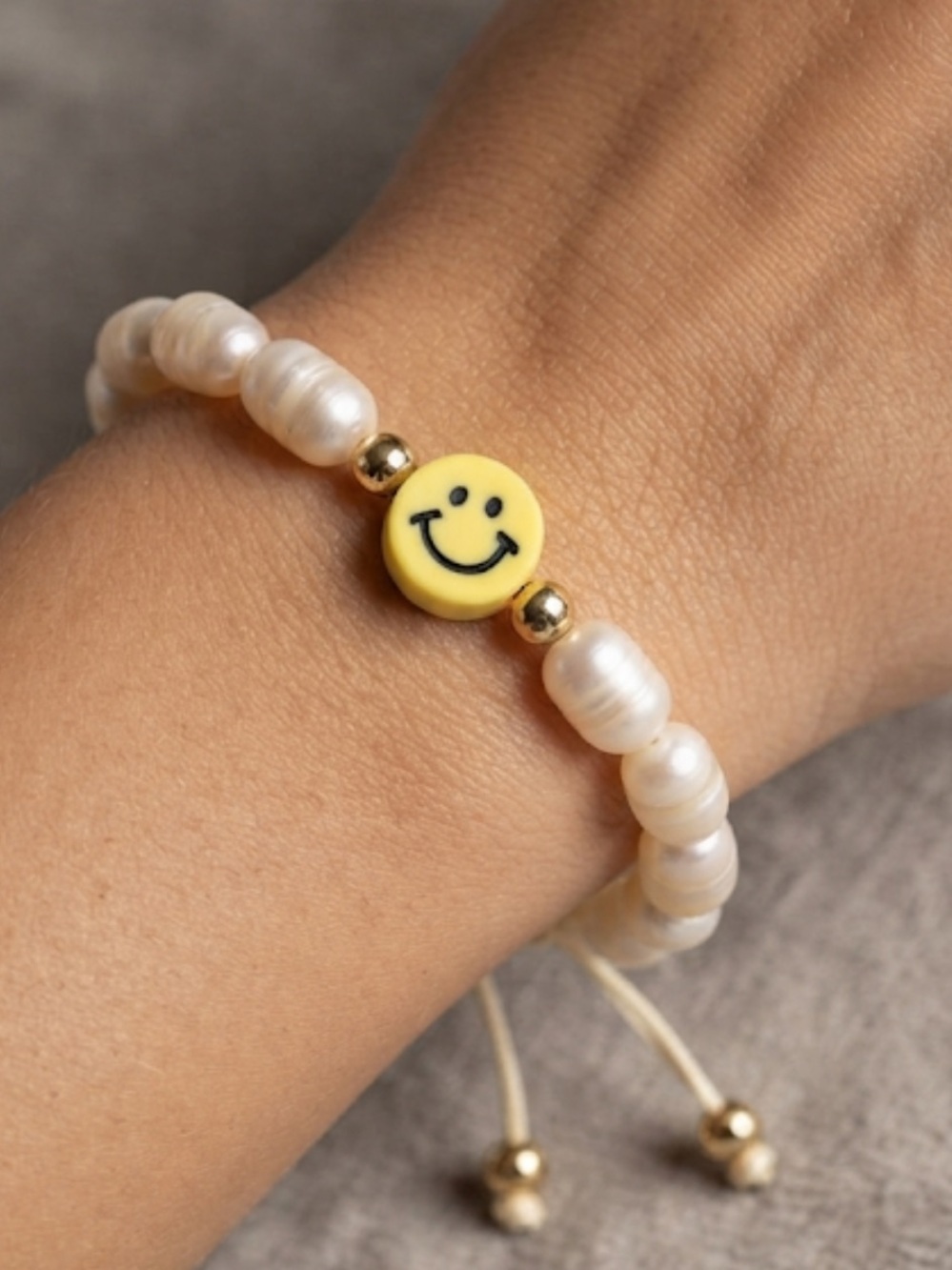 Pearl Bead Bracelet with Yellow Smiley Charm and Gold Accents